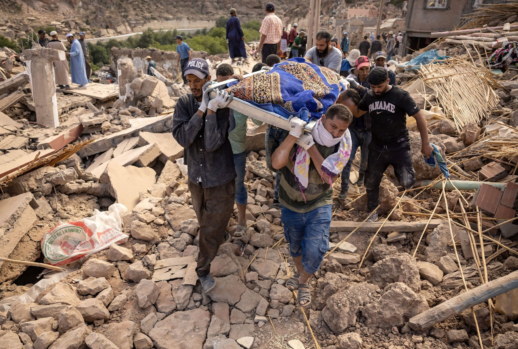 Morocco residents navigating through debris